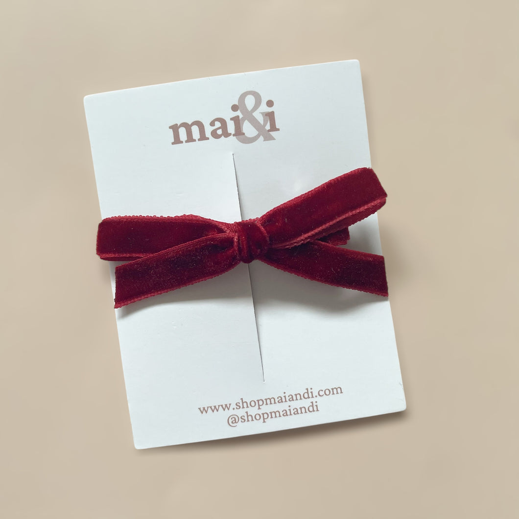 red velvet bow clip